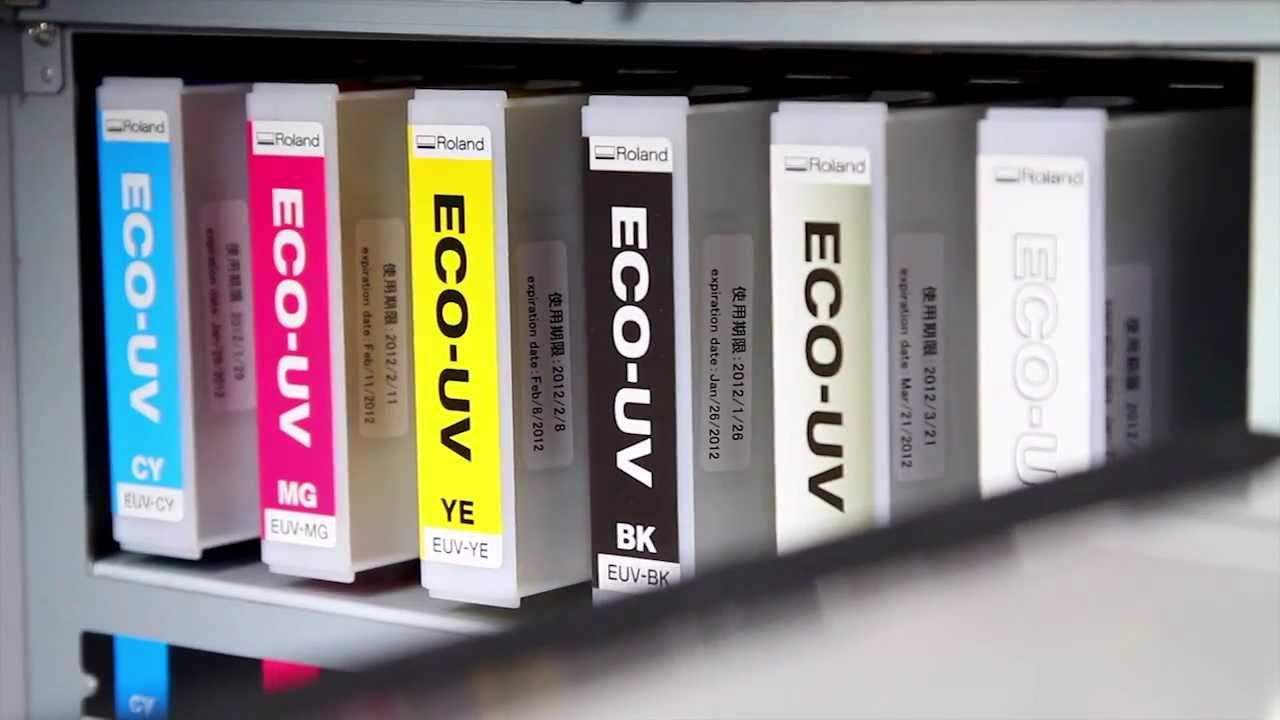 Roland ECO-UV Inks cartridges arranged in a printer, showing different ink variants for UV printing applications. 