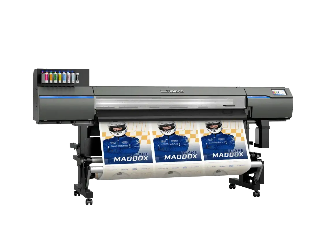 Wide format printer producing repeated high-quality graphic poster prints on rolled media, showcasing the output capabilities of a professional print and cut machine setup. 