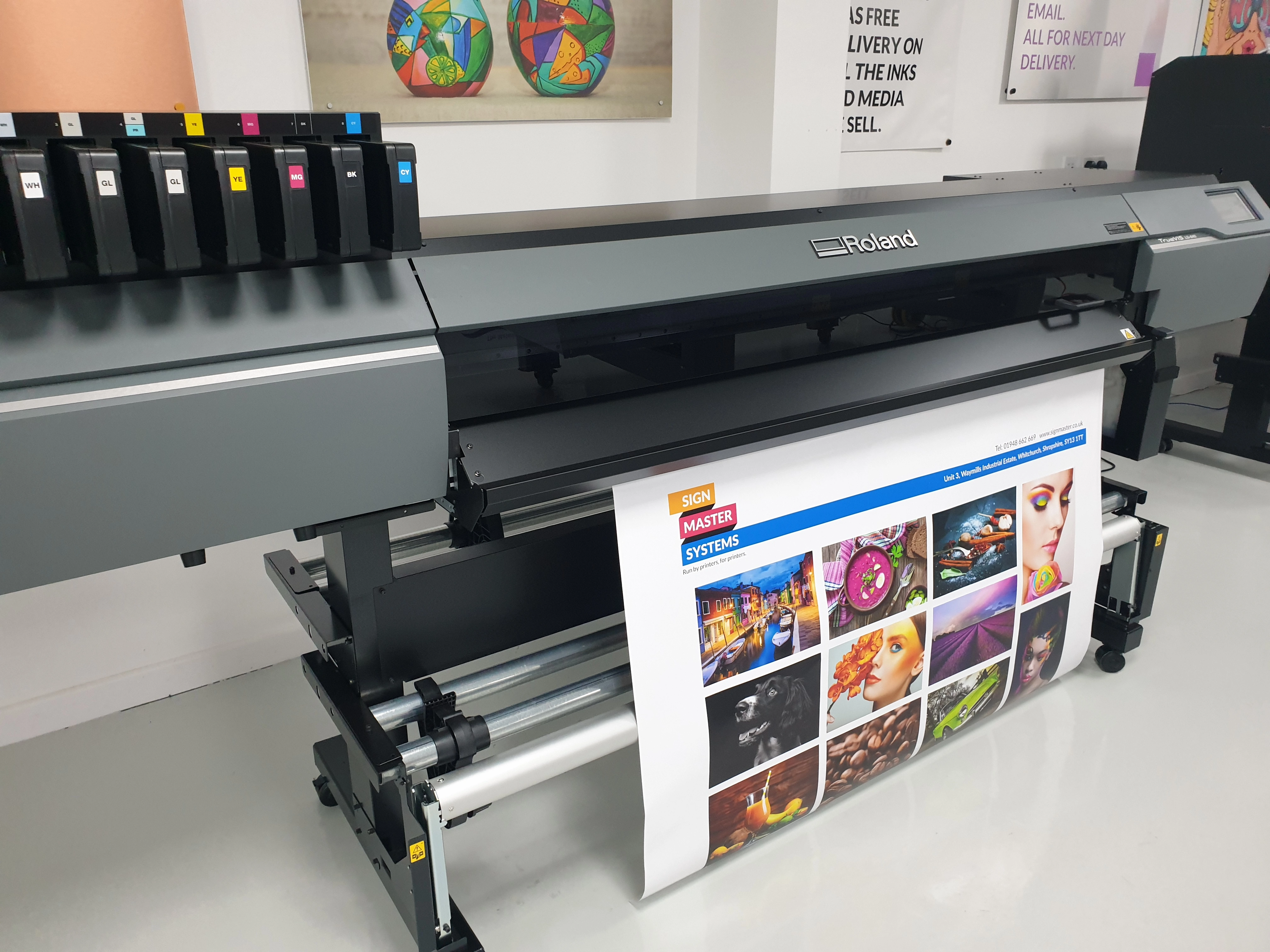 A Roland LG UV print and cut machine showing how it can be used to boost your printing 