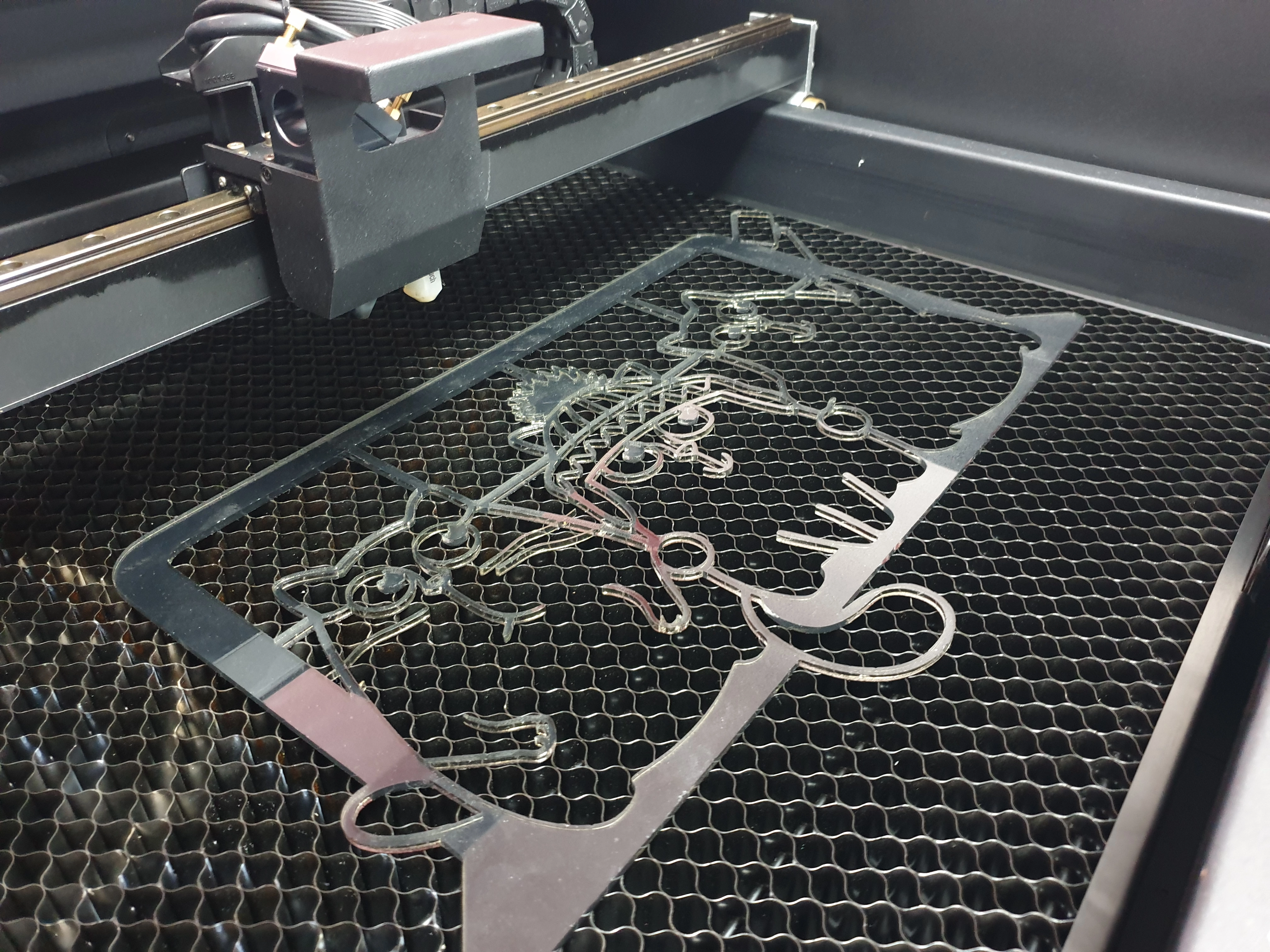A laser cutter machine showcasing how you can harness the innovative power of one for your printing business 