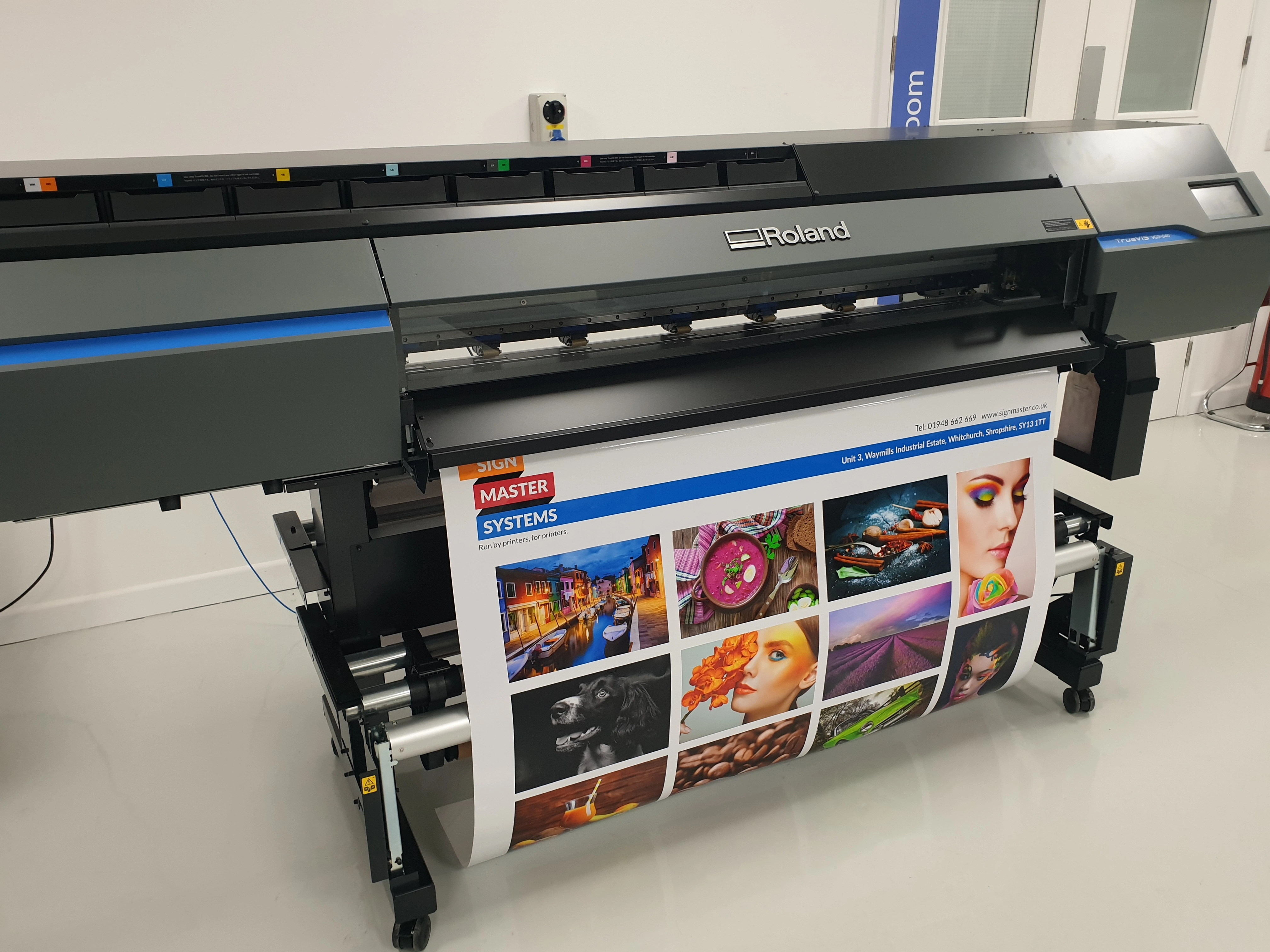 A close up of the Roland VG3 printer in use to show why its a must have for your printing business